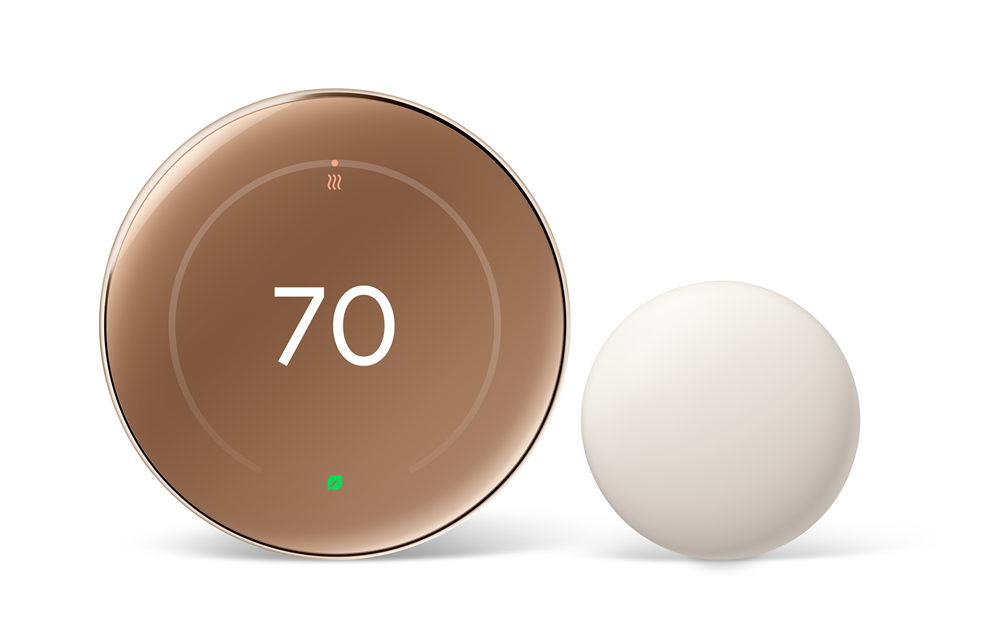 Nest Thermostat in Polished Gold with ivory sensor